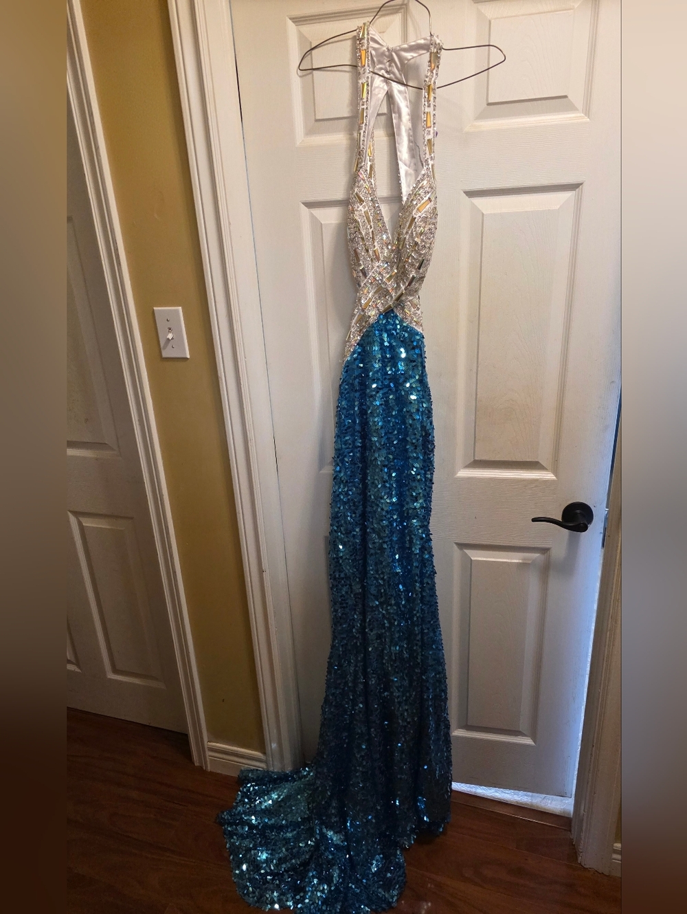 Elegant Blue Sequin Evening Gown with Silver Embellished Bodice